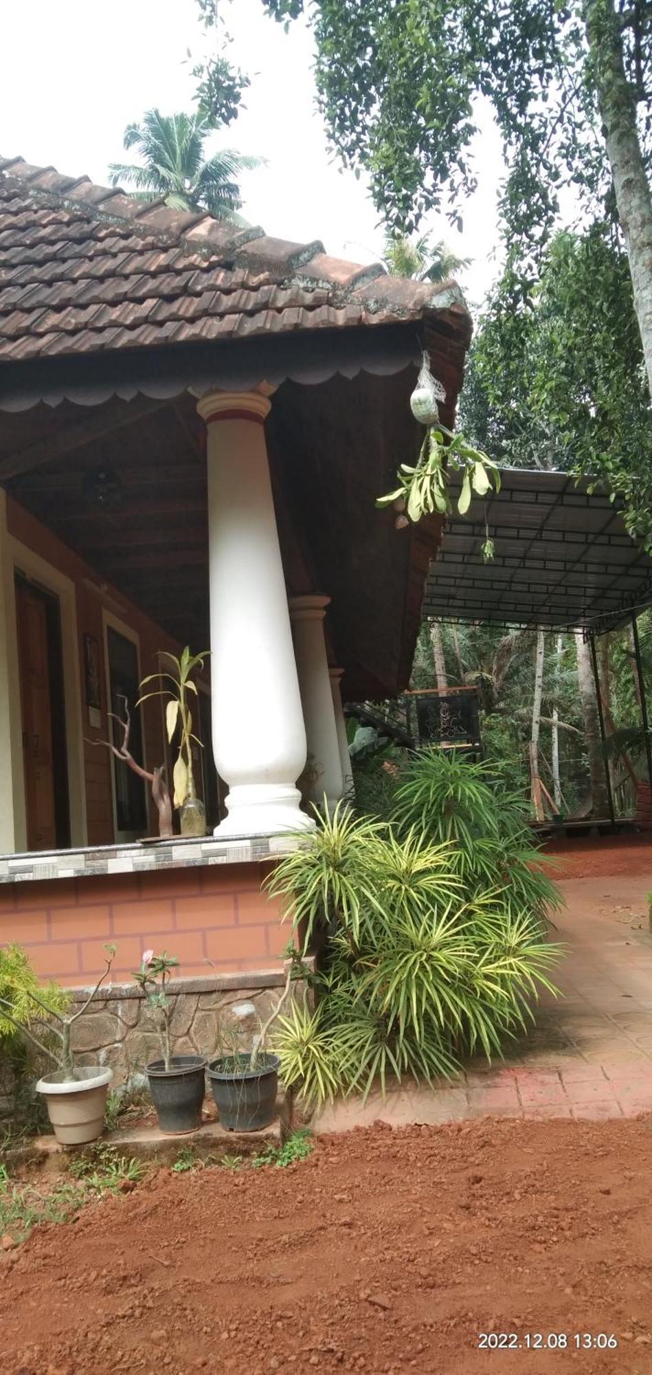 The Munroe Vibes Inn Mundrothuruth Phòng bức ảnh