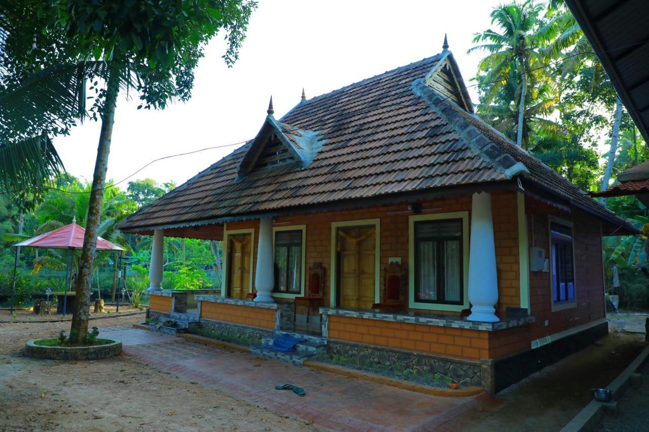 The Munroe Vibes Inn Mundrothuruth Ngoại thất bức ảnh